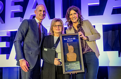 Photo of Jim Hagen, Teri Schmidt, and Governor Kristi Noem